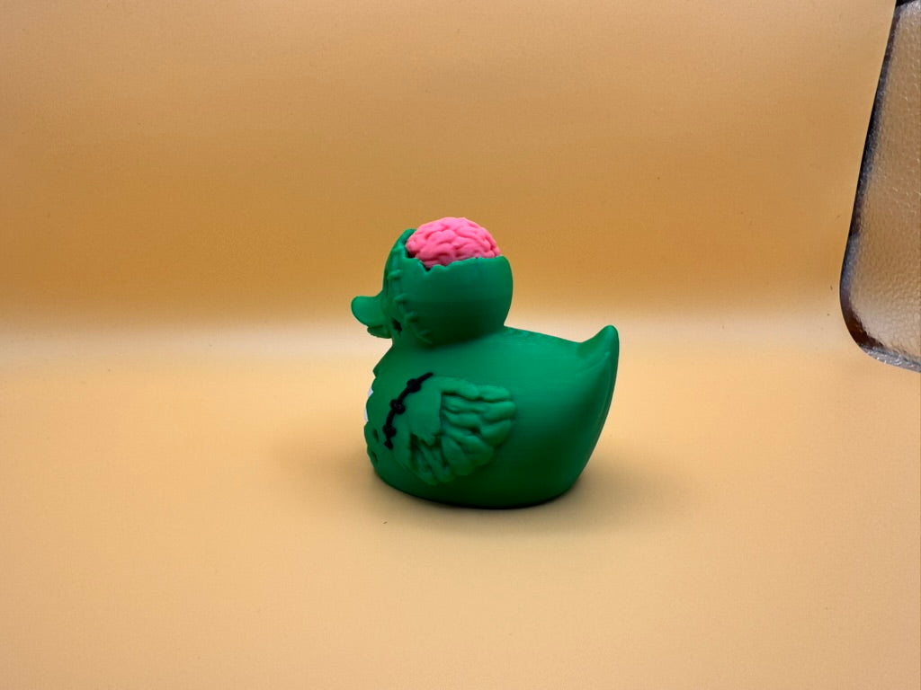 Zombie Duck Figurine – Spooky-Cute Halloween Decor with Exposed Brain and Stitched Details