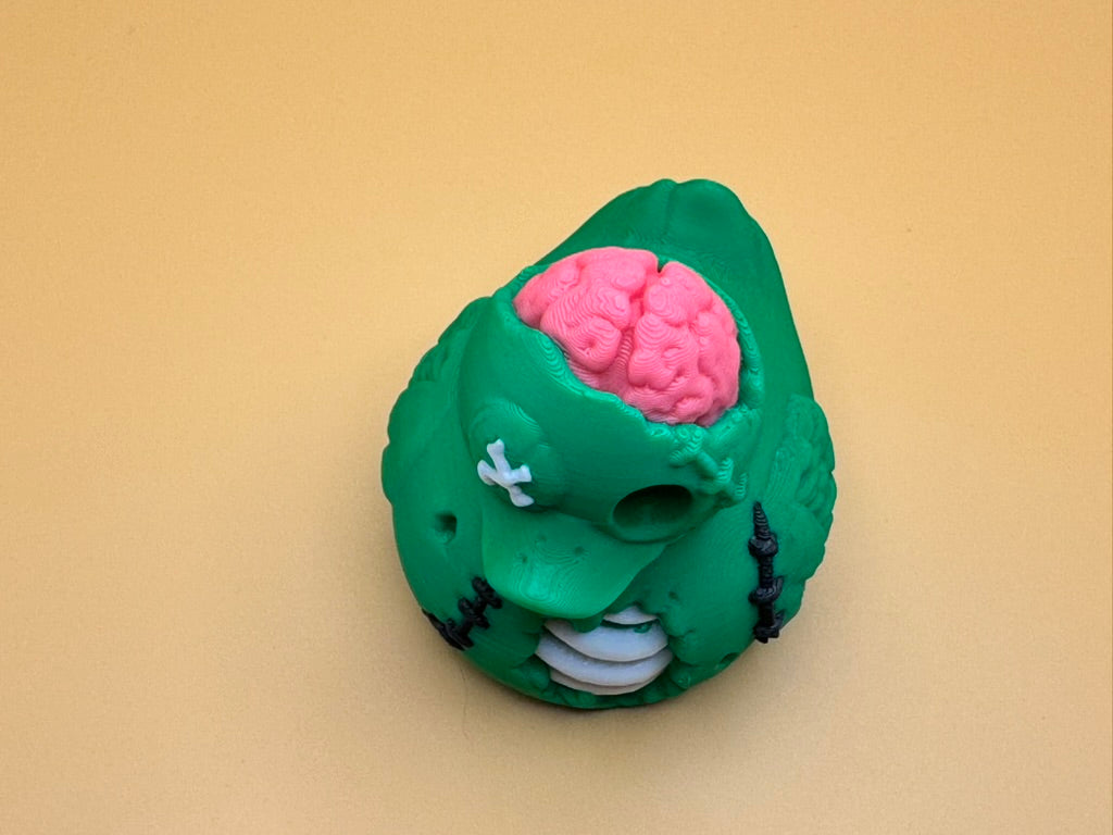 Zombie Duck Figurine – Spooky-Cute Halloween Decor with Exposed Brain and Stitched Details